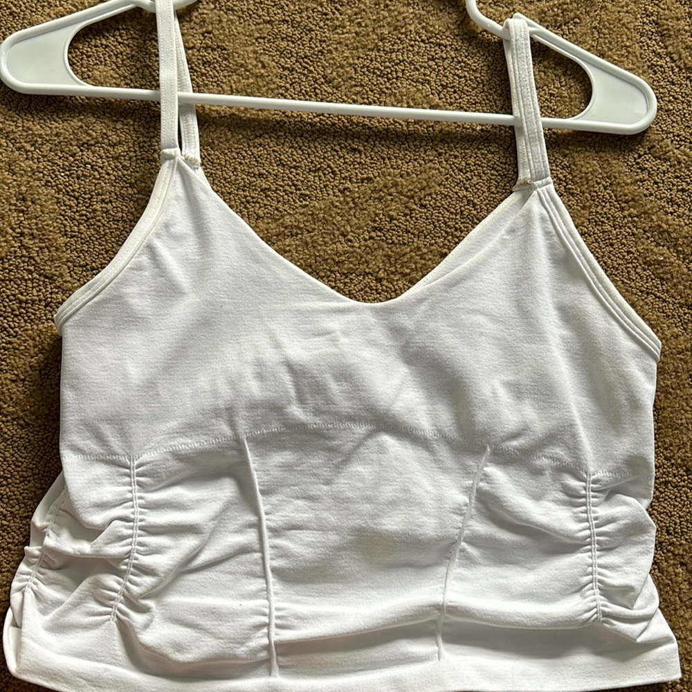 White free people movement tank top size medium
